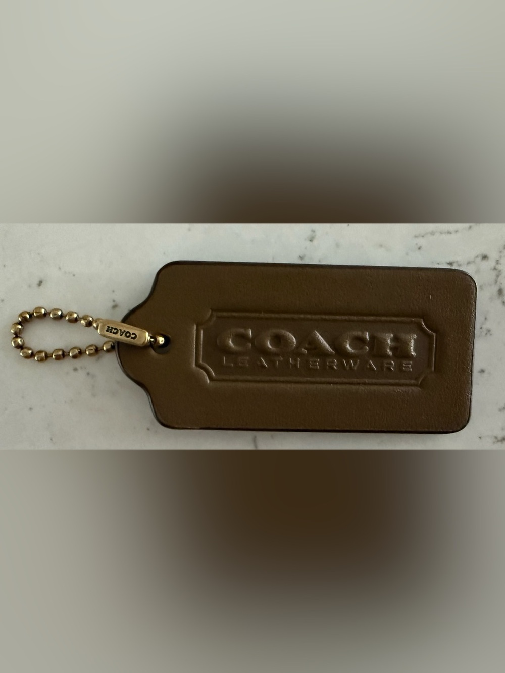 Coach leather tag